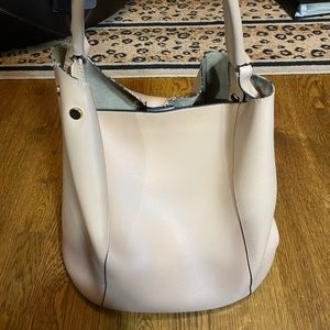 A New Day flesh colored bucket shoulder purse